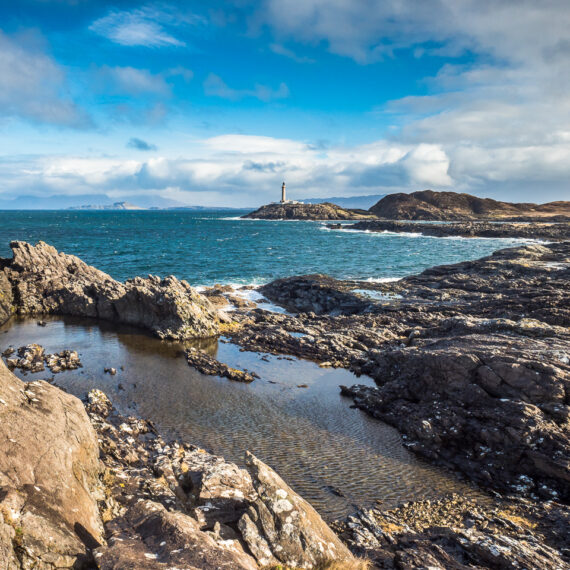 Travel photography Scotland: Ardnamurchan lighthouse seen from Corrachadh Mòr, the westernmost point on the British mainland, in Scotland.