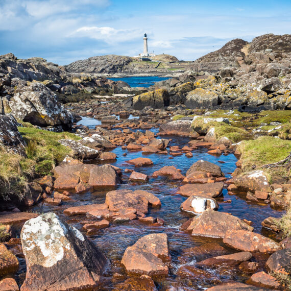 Travel photography Scotland: Ardnamurchan Lighthouse seen from a nearby burn, Scotland.