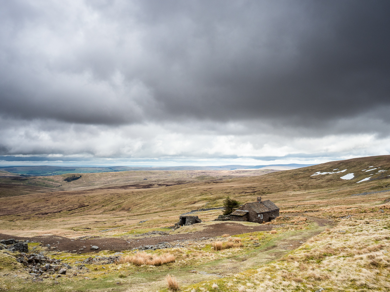 Adventure travel photography: Greg's Hut, a bothy (mountain shelter) on the Pennine Way long-distance footpath near Cross Fell, a mountain in Cumbria, UK, on 22 April 2018.