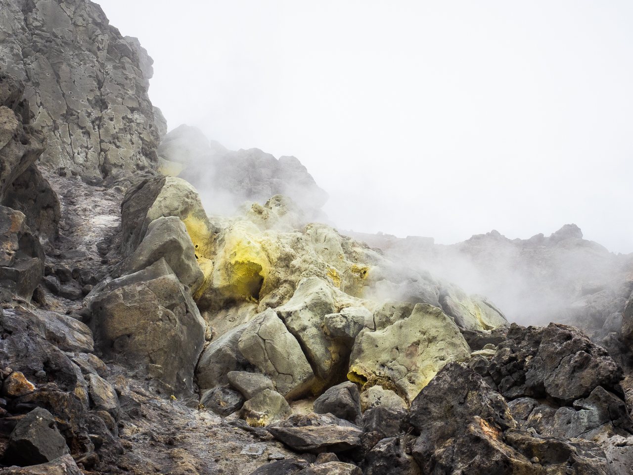 A fumarole (volcanic fissure) releasing steam and sulphur dioxide near the summit of Mount Yake, a volcano in Kamikōchi (the Upper Highlands) in the Hida Mountains, Nagano Prefecture, Japan.