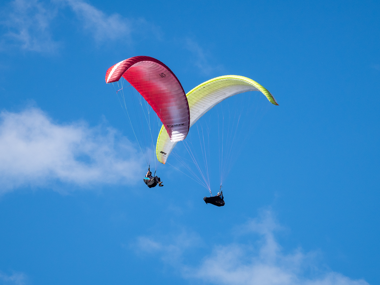 Paragliders fly from the Litlington White Horse, a monument in the Cuckmere Valley, East Sussex, England.
