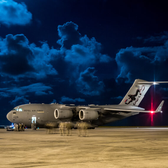 Humanitarian aid photography: UK military personnel prepare to board an RAF C-17 transport aircraft and Voyager passenger aicraft supporting humanitarian aid operations at Grantley Adams International Airport in Bridgetown, Barbados, on 8 September 2017.Royal Air Force logisticians from RAF Brize Norton have assisted with the delivery of military personnel and aid cargo to the Caribbean to support disaster relief in the wake of Hurricane IRMA. RAF aircraft - including C-17, A400M and Voyager aircraft - are supporting a joint task force of RAF, Royal Marines, Army and Royal Navy personnel who are supporting the Department for International Development as it delivers aid to stricken Caribbean islands.