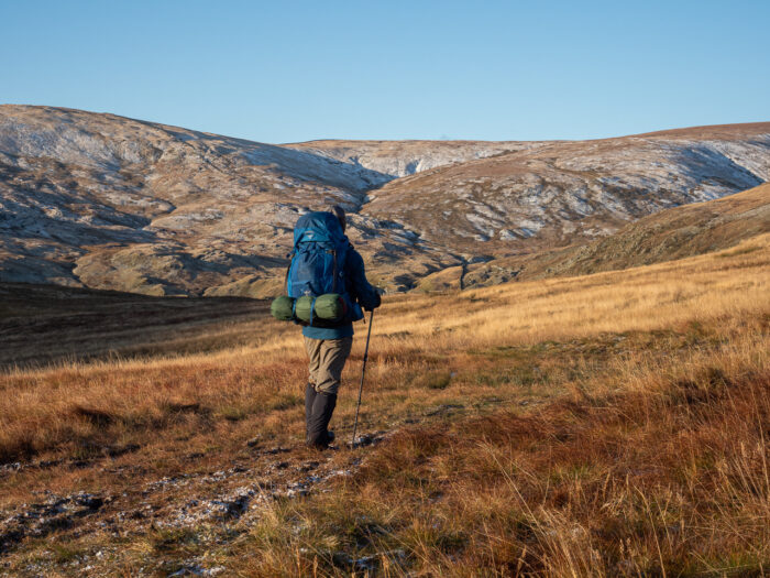 Travel journalism: A hiker in the Shap Fells in the Lake District, Cumbria, England.
