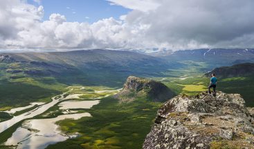 Adventure filmmaker capturing remote wilderness locations, demonstrating expertise for charity outdoor video production